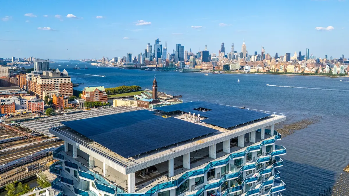 Rooftop solar panels with NYC skyline